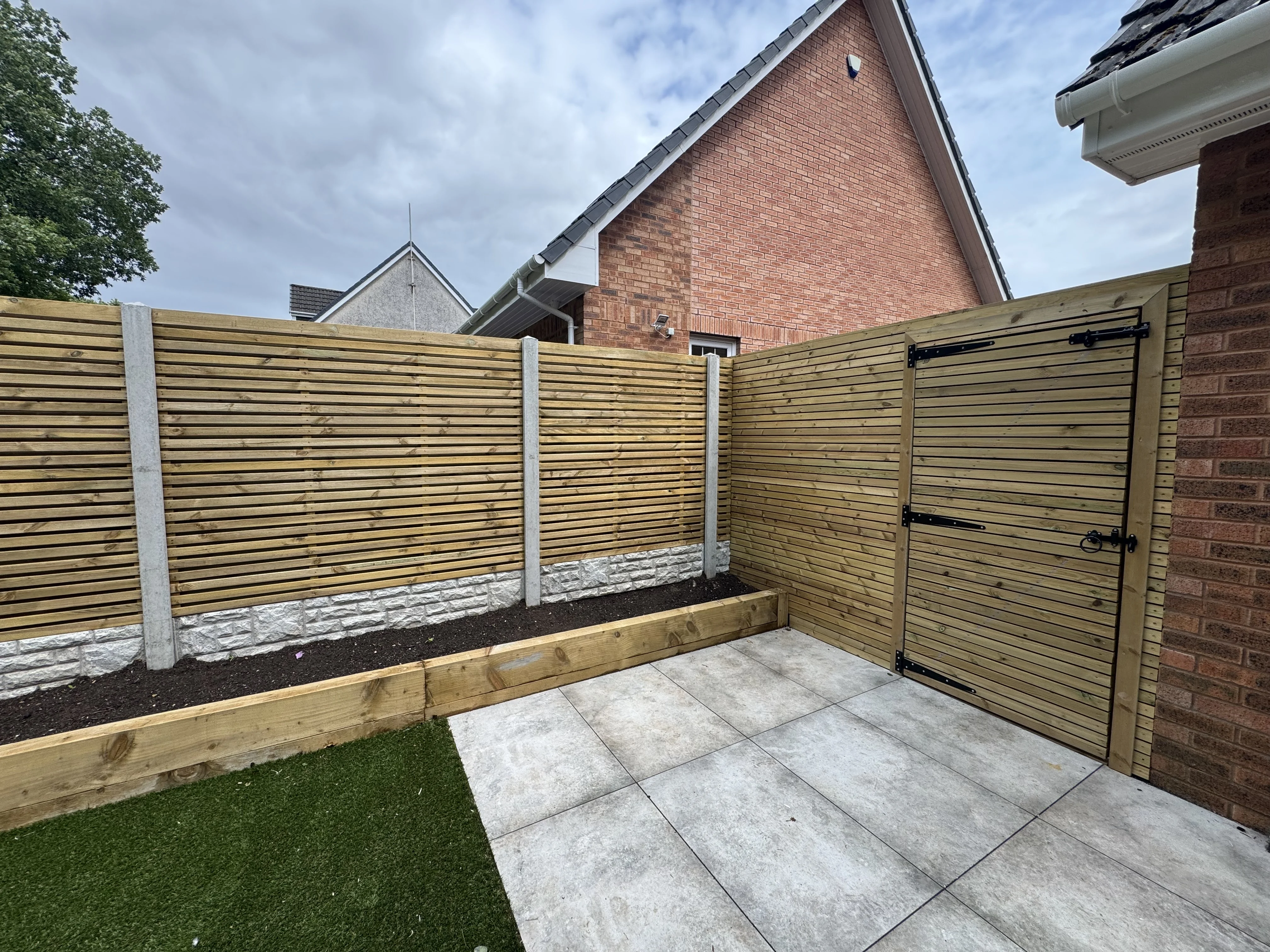 Professional wooden gate and fencing installation completed by Ayrshire Fencing Group in Ayrshire